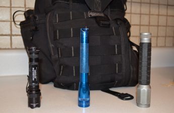 maglites in front of backpack