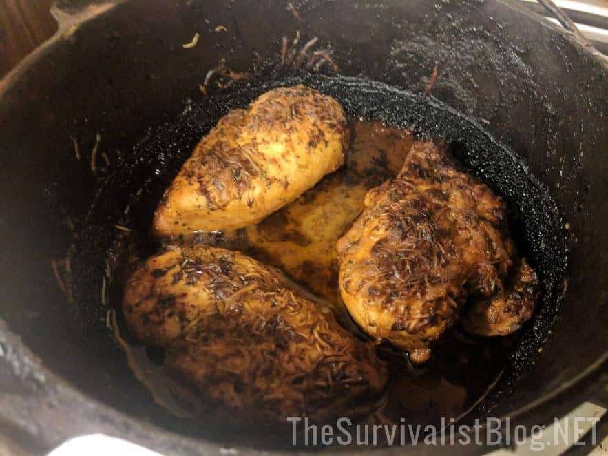 marinated chicken in cast iron skillet